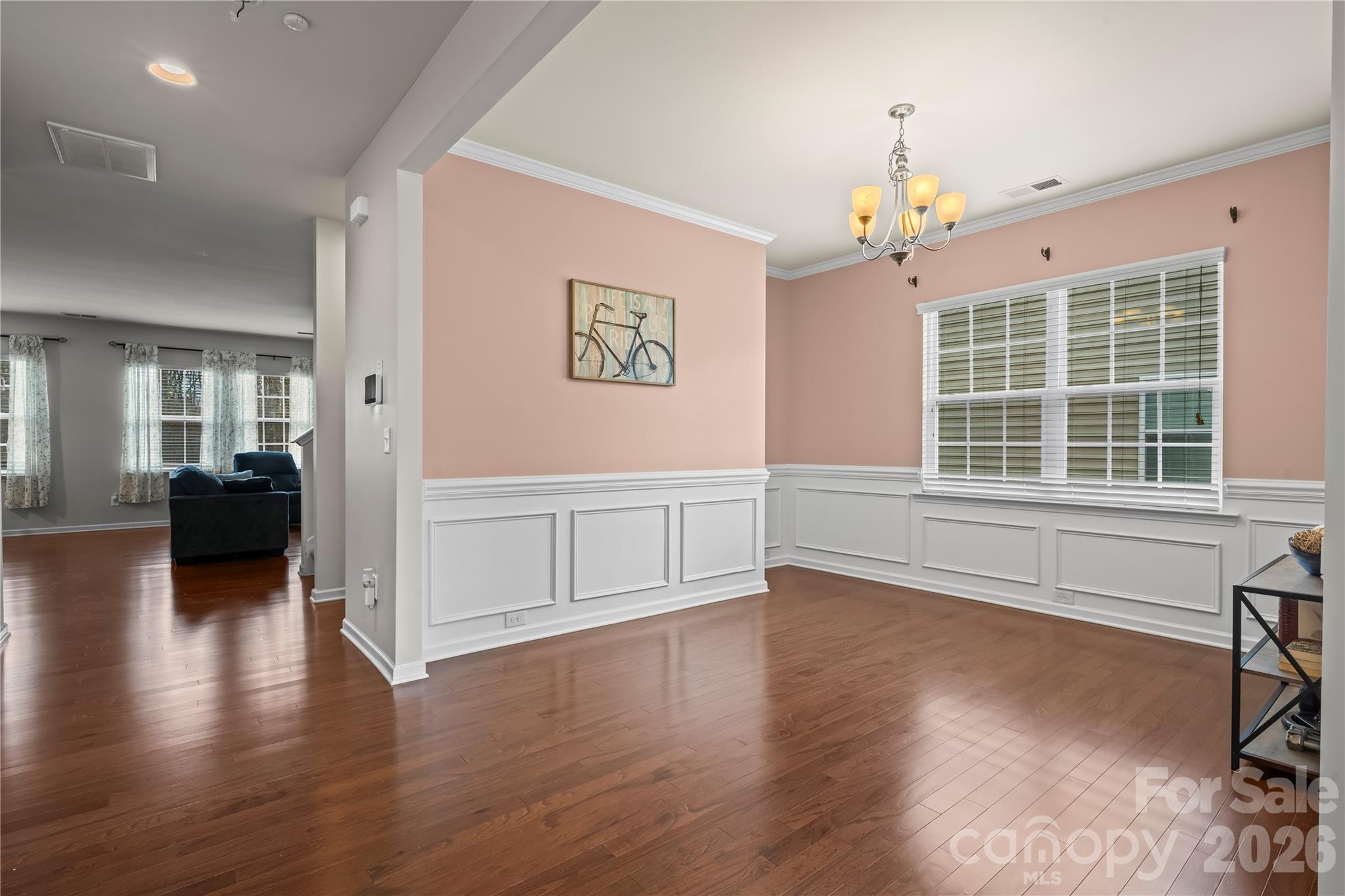 10666 Sapphire Trail Davidson, NC 28036 - Photo 5 of 34 a view of livingroom with furniture wooden floor and windows