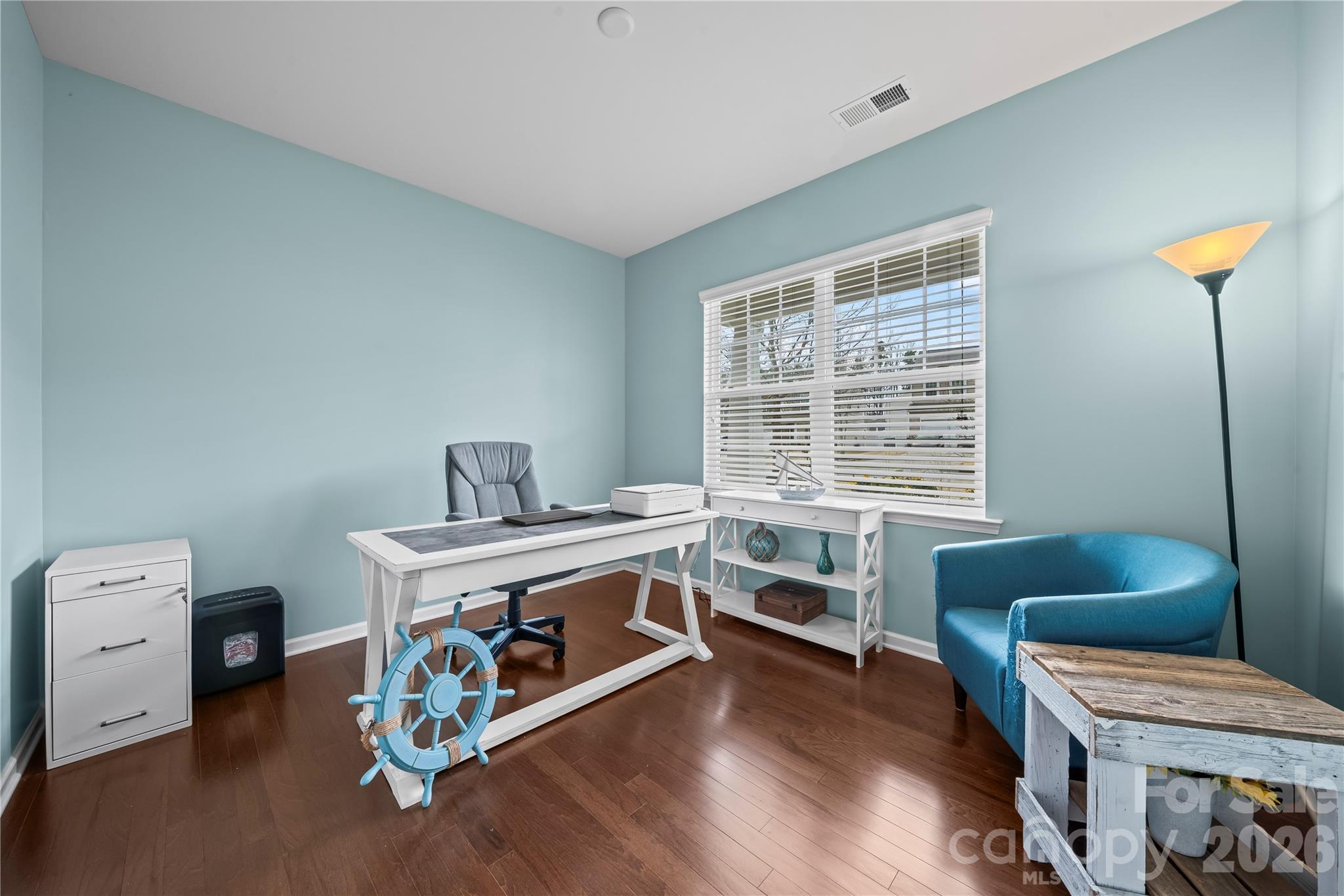 10666 Sapphire Trail Davidson, NC 28036 - Photo 6 of 34 a view of a room with furniture and wooden floor