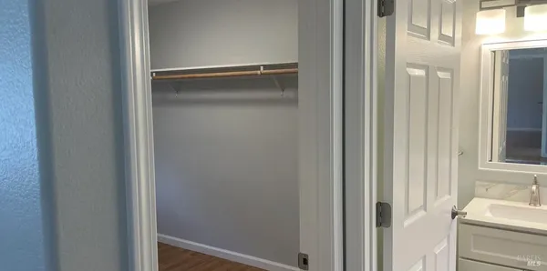 a bathroom with a glass shower door