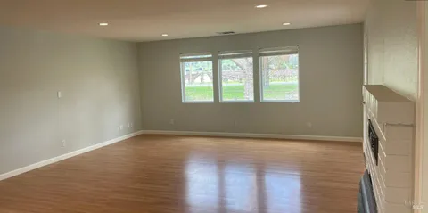 a view of a back yard of the house