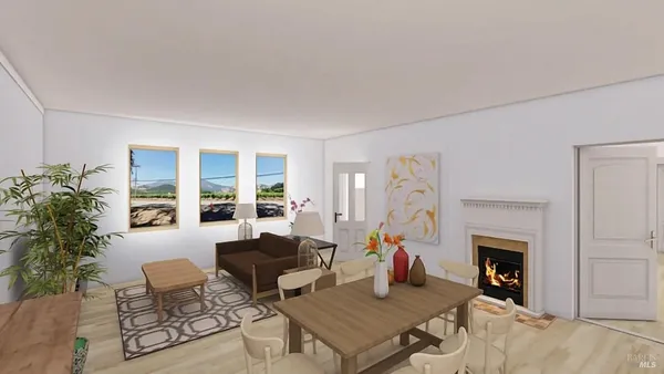 a living room with furniture a window and a fireplace