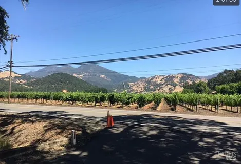 a view of a road with a yard