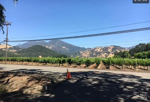 a view of a road with a yard