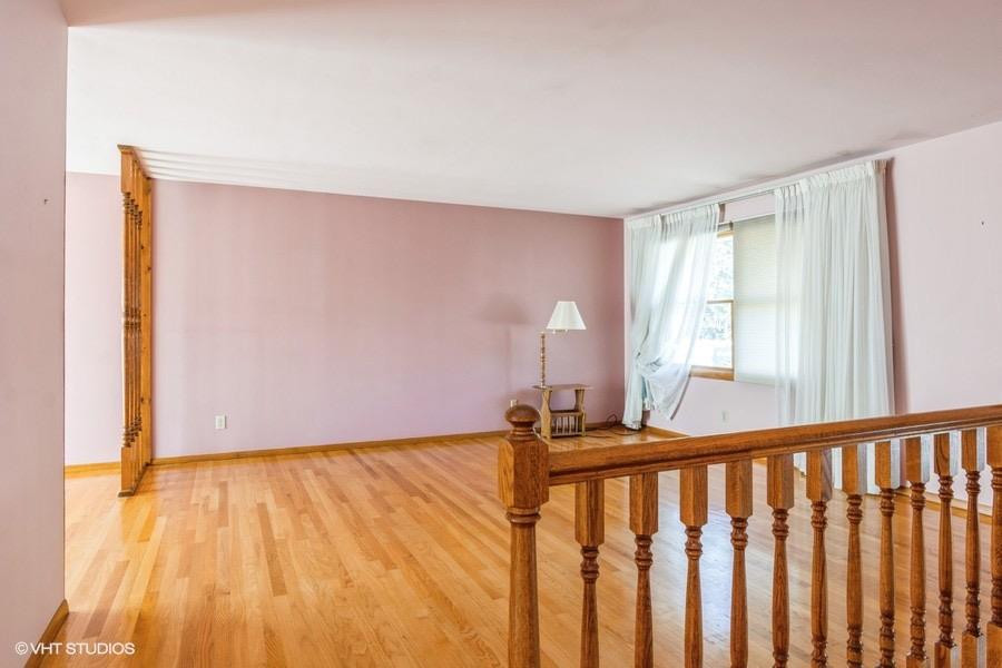 1349 North Dwiggins Street Griffith, IN 46319 - Photo 3 of 15 a bedroom with a bed and a window