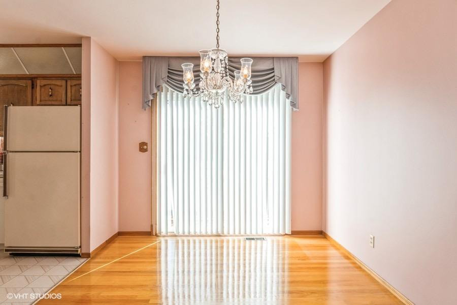 1349 North Dwiggins Street Griffith, IN 46319 - Photo 4 of 15 a view of entryway with wooden floor