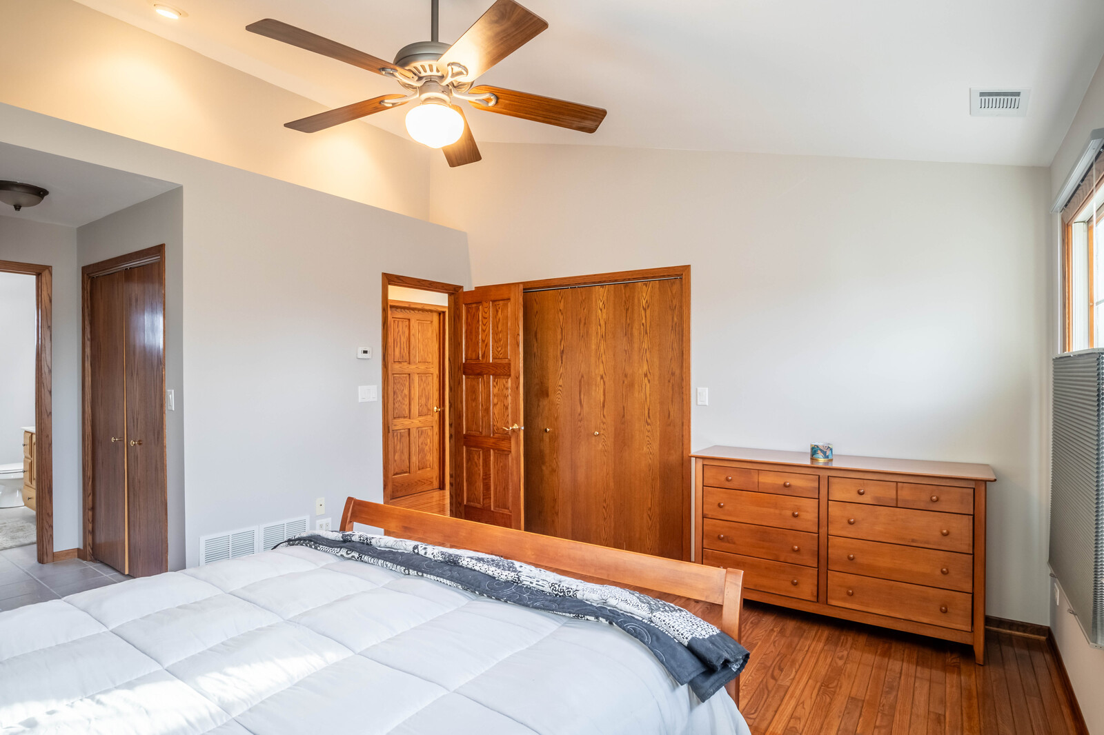 2306 Jay Lane Rolling Meadows, IL 60008 - Photo 15 of 30 a bedroom with a bed and a ceiling fan