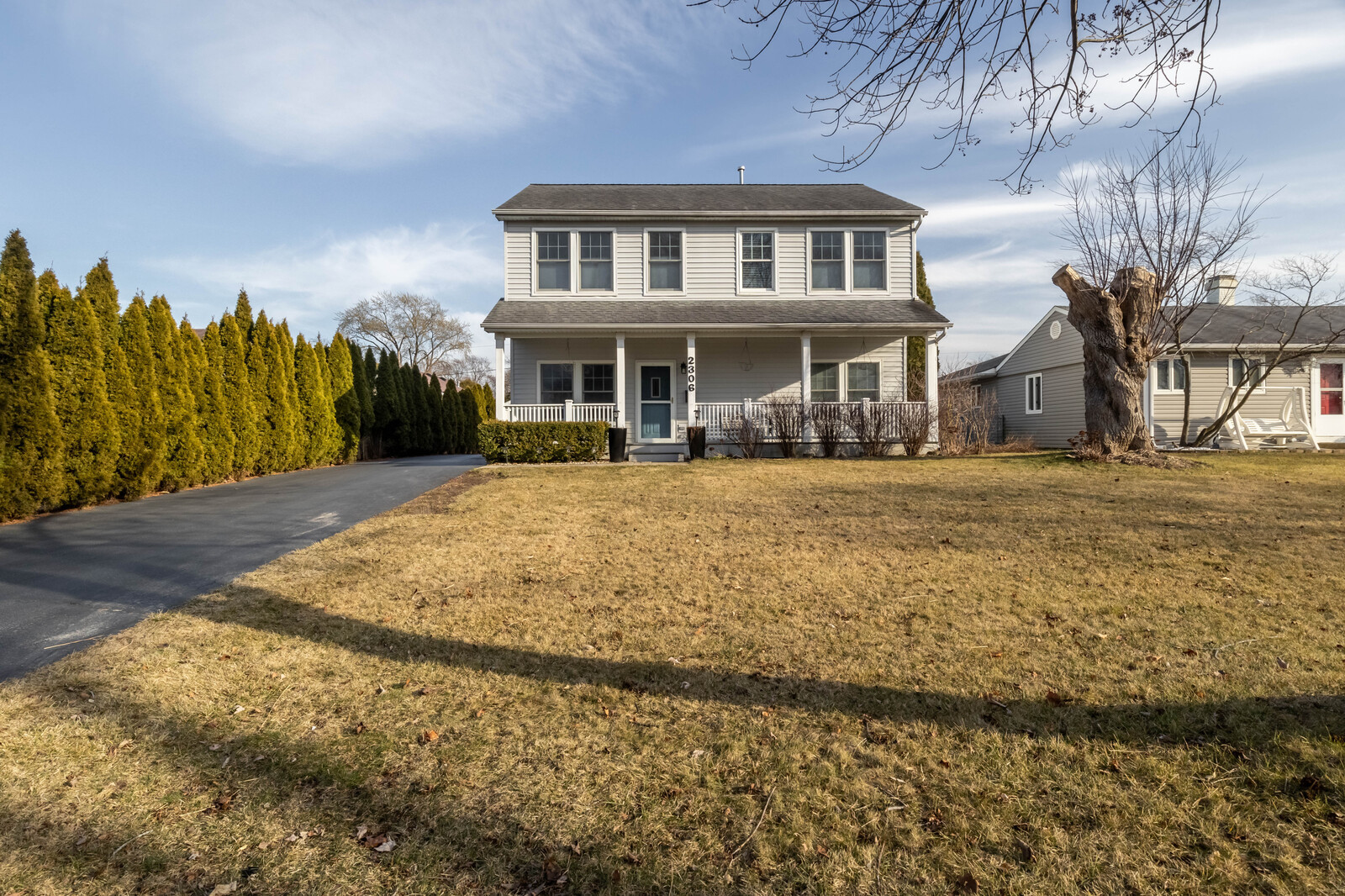 2306 Jay Lane Rolling Meadows, IL 60008 - Photo 2 of 30 a front view of a house with a yard