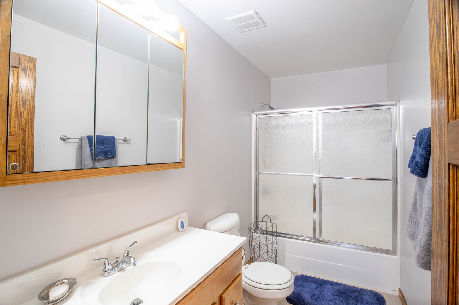 2306 Jay Lane Rolling Meadows, IL 60008 - Photo 24 of 30 a bathroom with a sink a toilet and shower