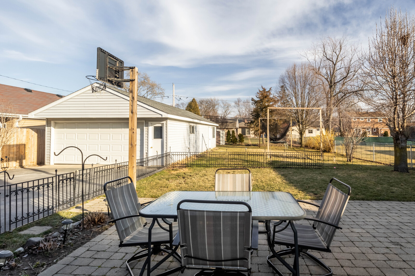 2306 Jay Lane Rolling Meadows, IL 60008 - Photo 25 of 30 a view of a patio with table and chairs with wooden floor and fence