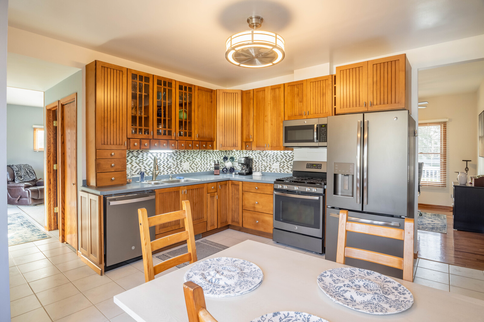 2306 Jay Lane Rolling Meadows, IL 60008 - Photo 3 of 30 a kitchen with stainless steel appliances granite countertop a refrigerator a stove and a sink