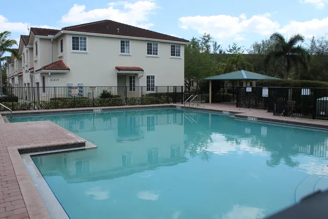 a front view of a house with a porch