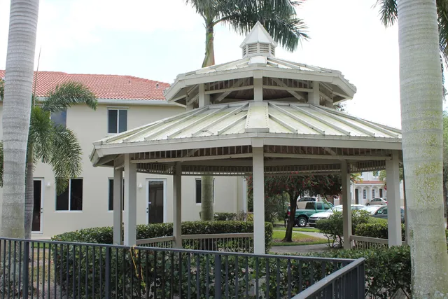 a childrens park with lots of swings and slides