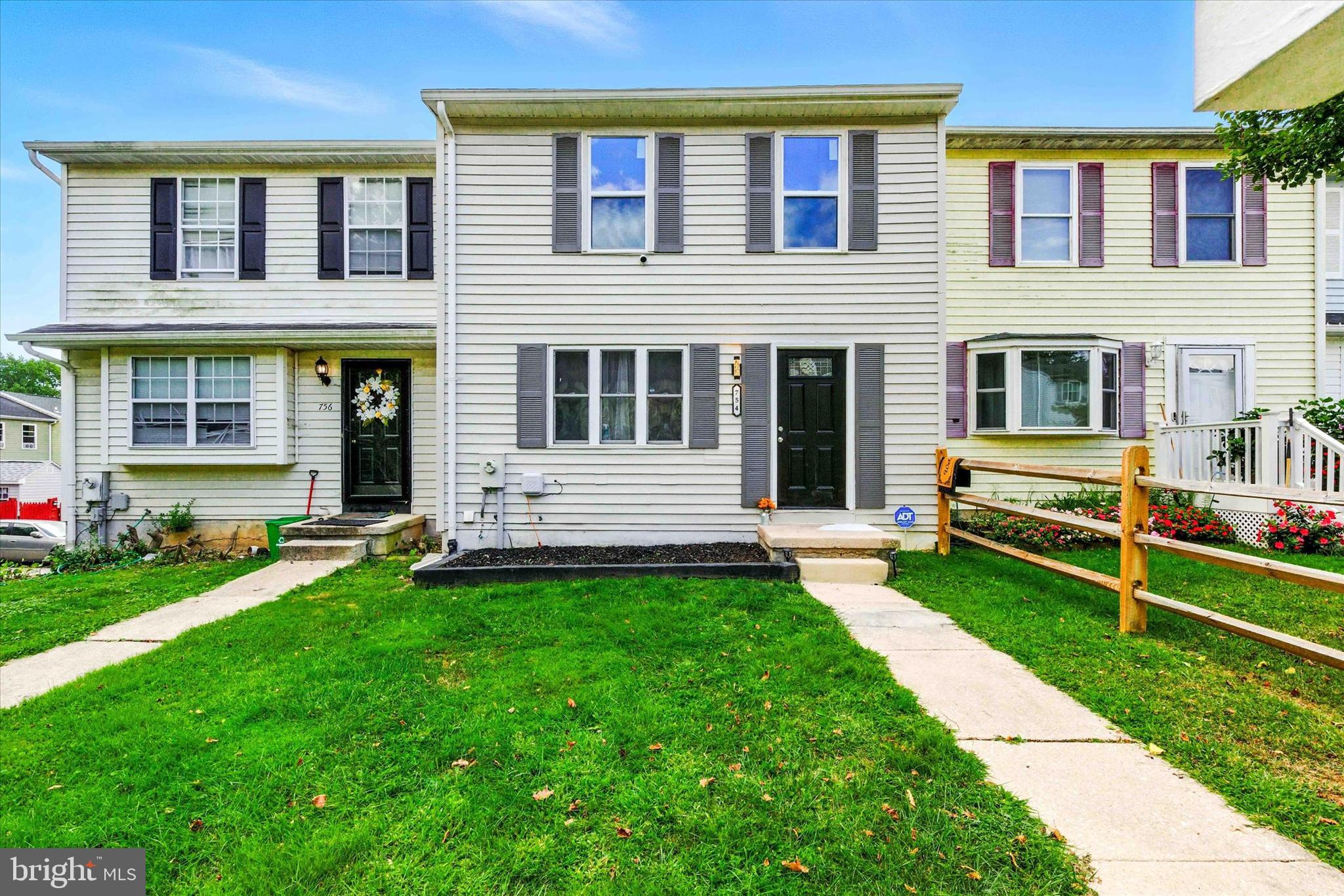 754 Custis Street Aberdeen, MD 21001 - Photo 1 of 19 a view of a house with a yard and sitting area