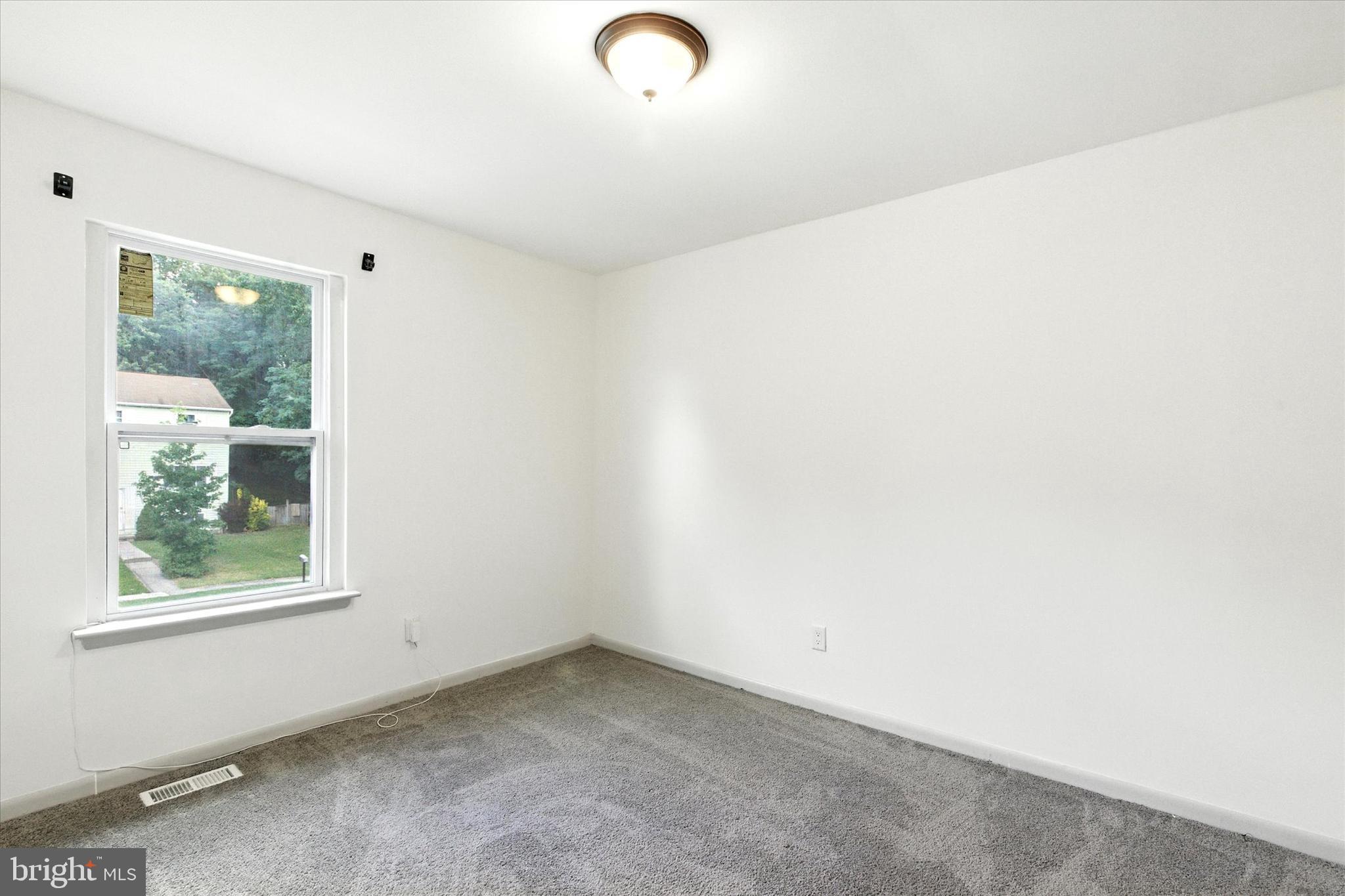 754 Custis Street Aberdeen, MD 21001 - Photo 12 of 19 an empty room with windows