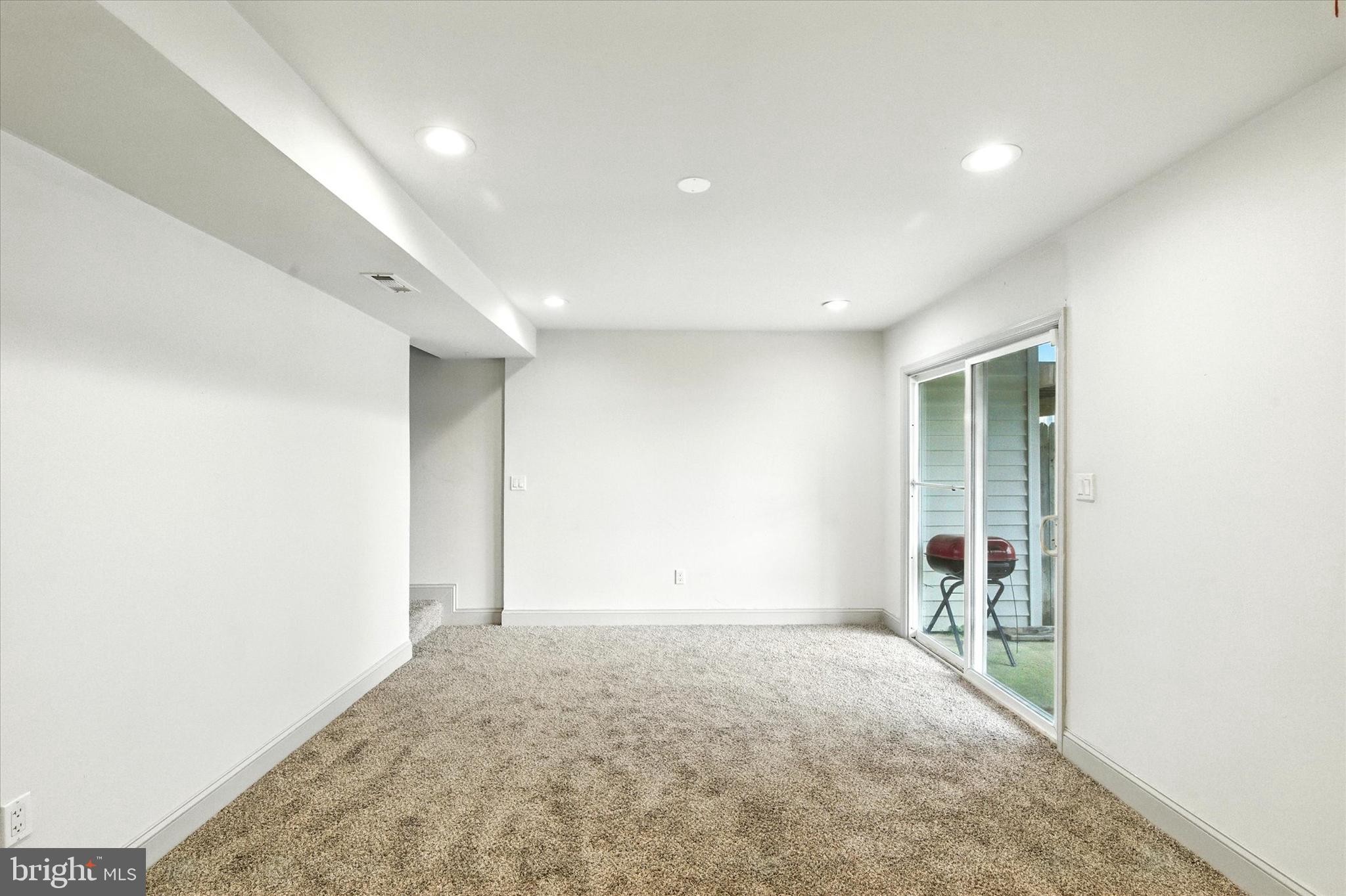 754 Custis Street Aberdeen, MD 21001 - Photo 16 of 19 an empty room with a natural light