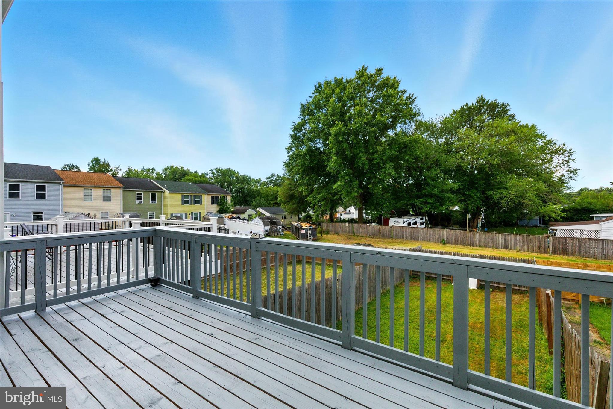754 Custis Street Aberdeen, MD 21001 - Photo 18 of 19 a view of balcony with wooden floor and fence