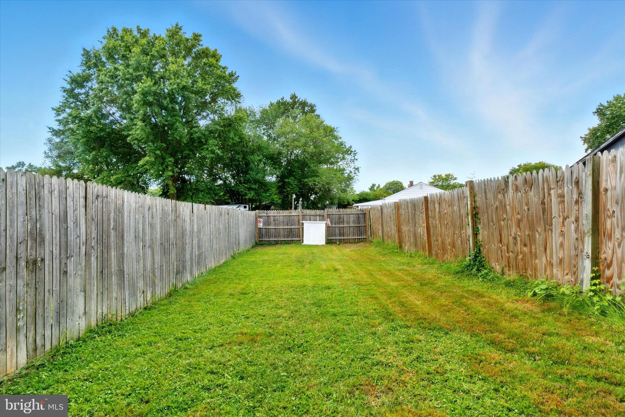 754 Custis Street Aberdeen, MD 21001 - Photo 19 of 19 a view of a yard with wooden fence
