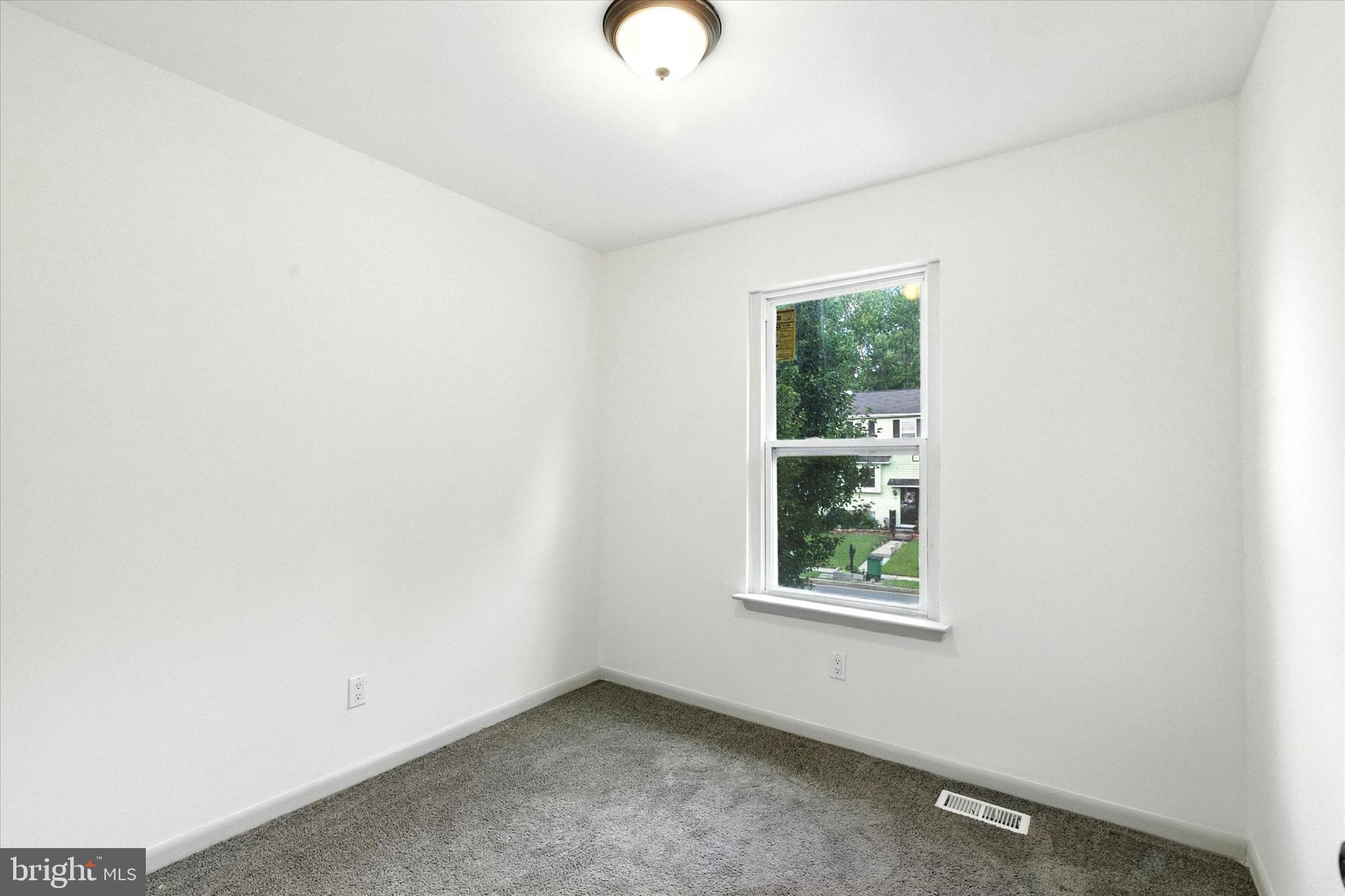 754 Custis Street Aberdeen, MD 21001 - Photo 10 of 19 an empty room with a window