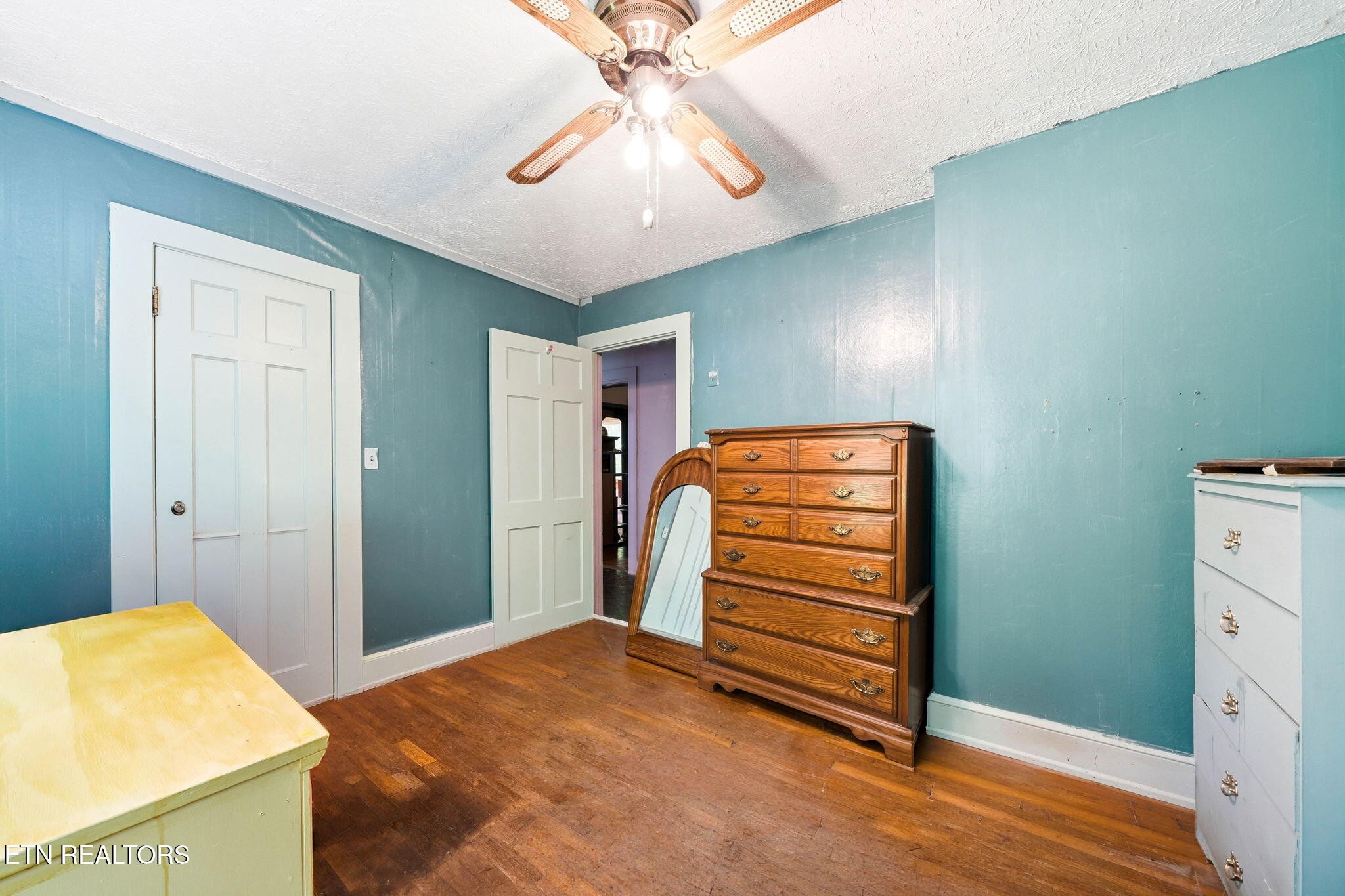 3992 Highway 92 Rutledge, TN 37861 - Photo 24 of 34 a bedroom with a bed and a chandelier