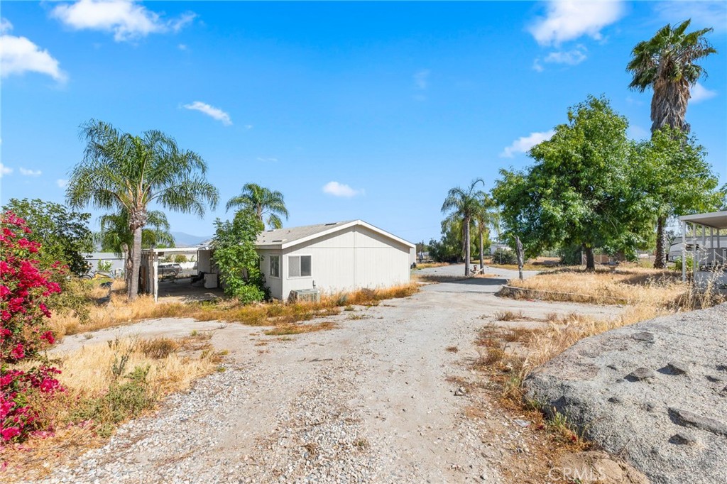 18420 Decker Road Perris, CA 92570 - Photo 5 of 15 a view of a house with a yard covered in snow