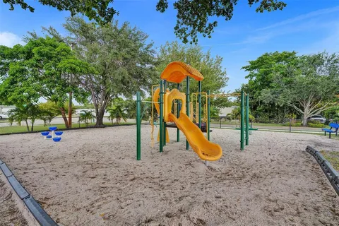 a view of a park with slide