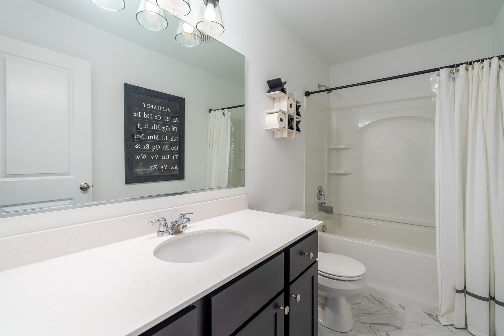 16316 Wheatgrass Street Lockport, IL 60441 - Photo 18 of 37 a bathroom with a sink a toilet and shower