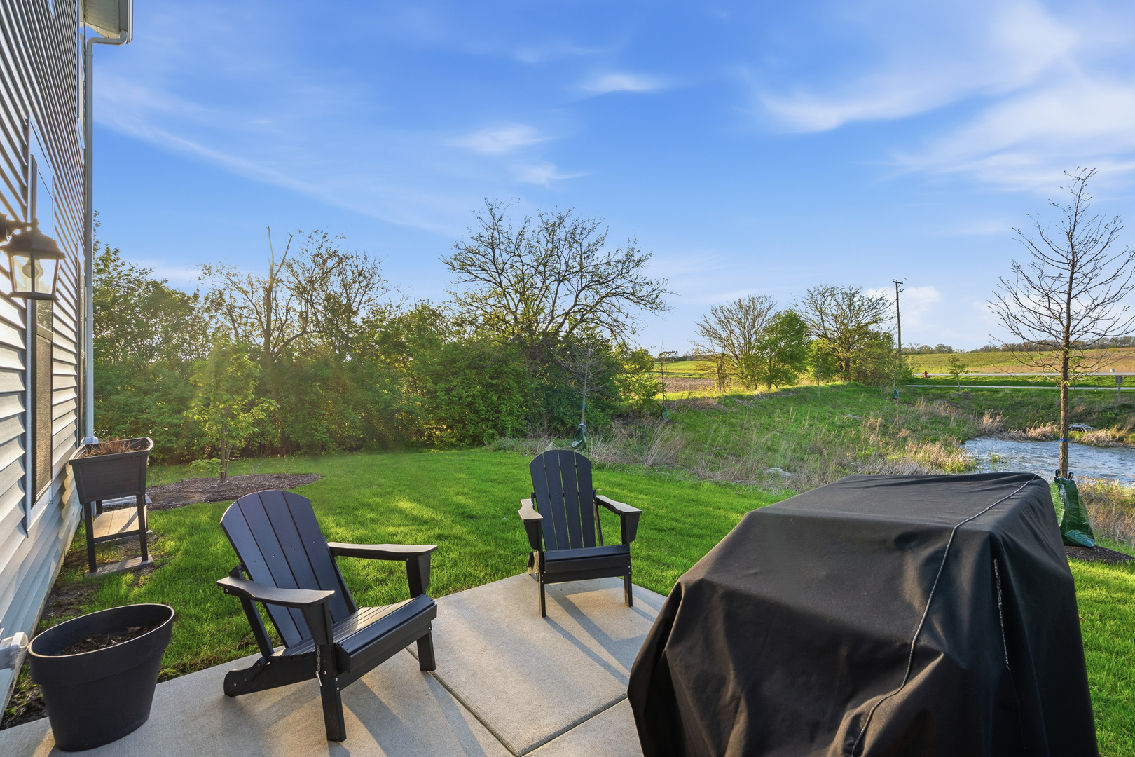 16316 Wheatgrass Street Lockport, IL 60441 - Photo 30 of 37 a view of a patio with chair and table