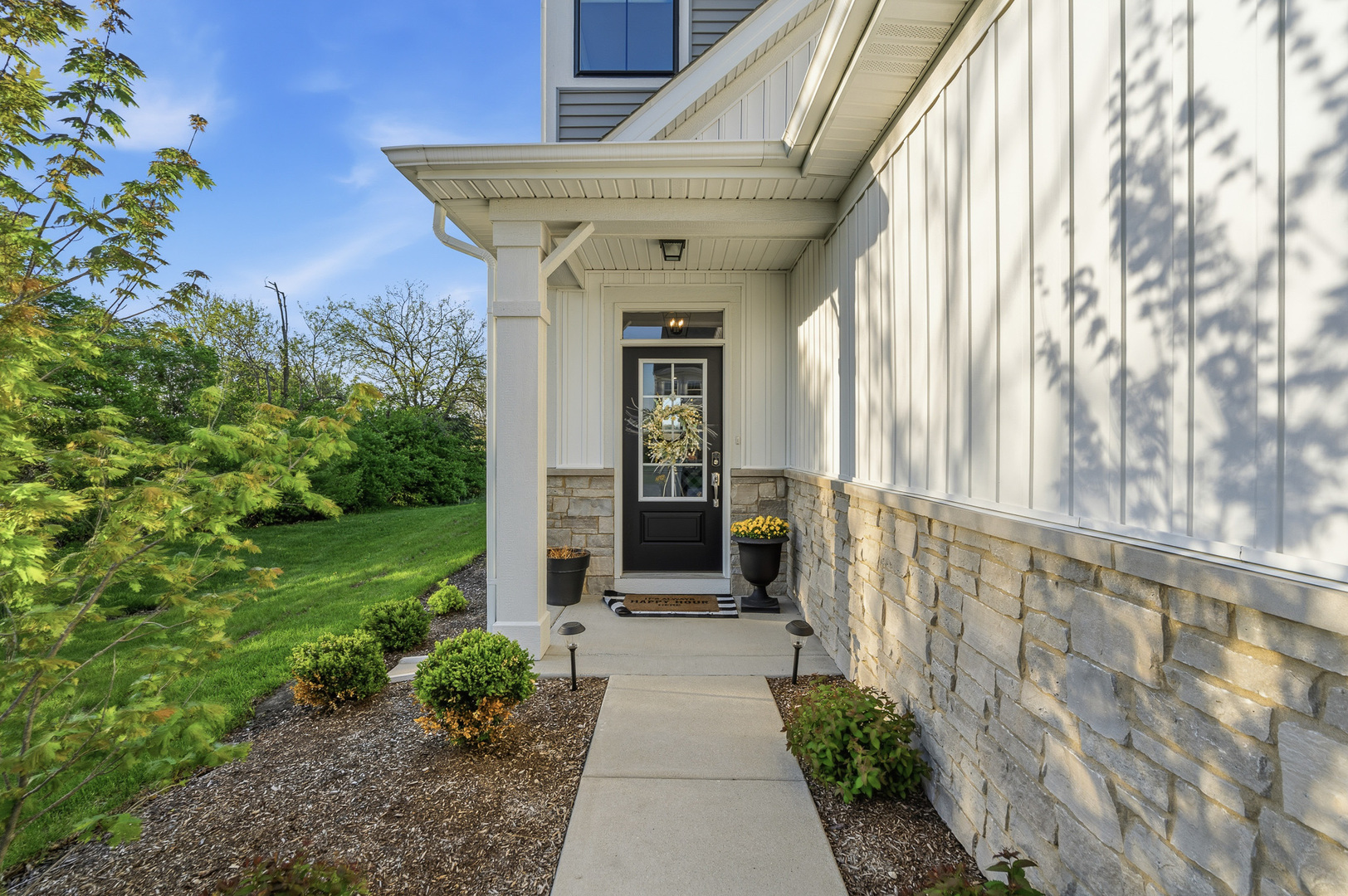 16316 Wheatgrass Street Lockport, IL 60441 - Photo 35 of 37 a view of a pathway of a house with garden