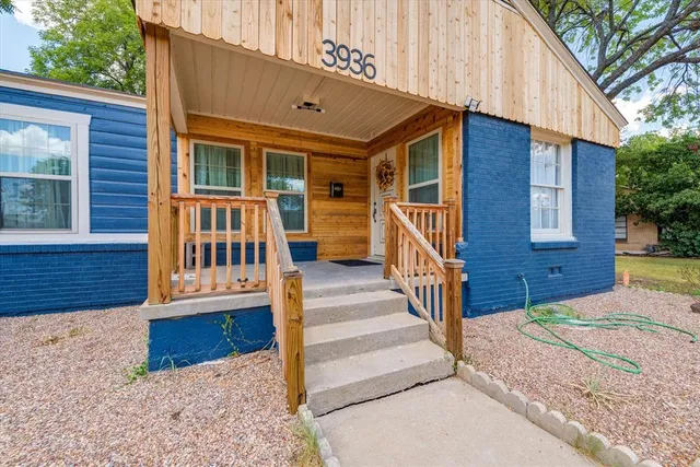 front view of a house with a small yard