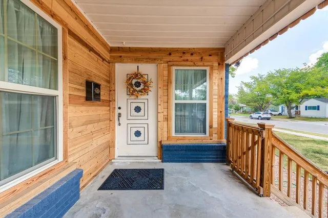 a view of entrance with stairs