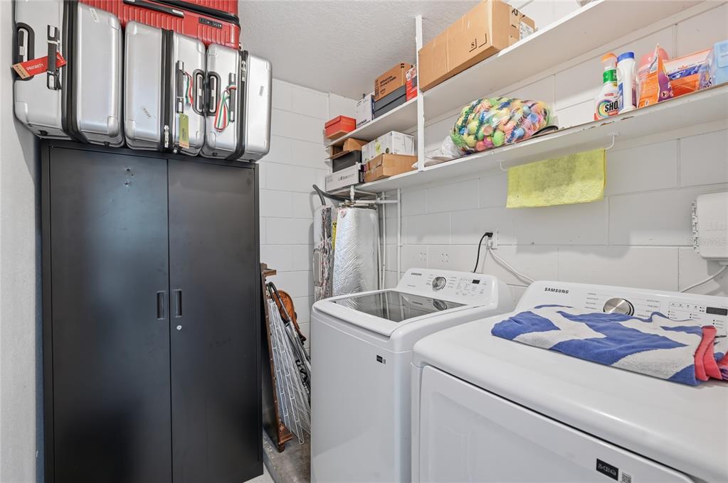 1946 Strathaven Road Winter Park, FL 32792 - Photo 27 of 37 a utility room with dryer and washer