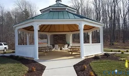 a view of a patio with a yard