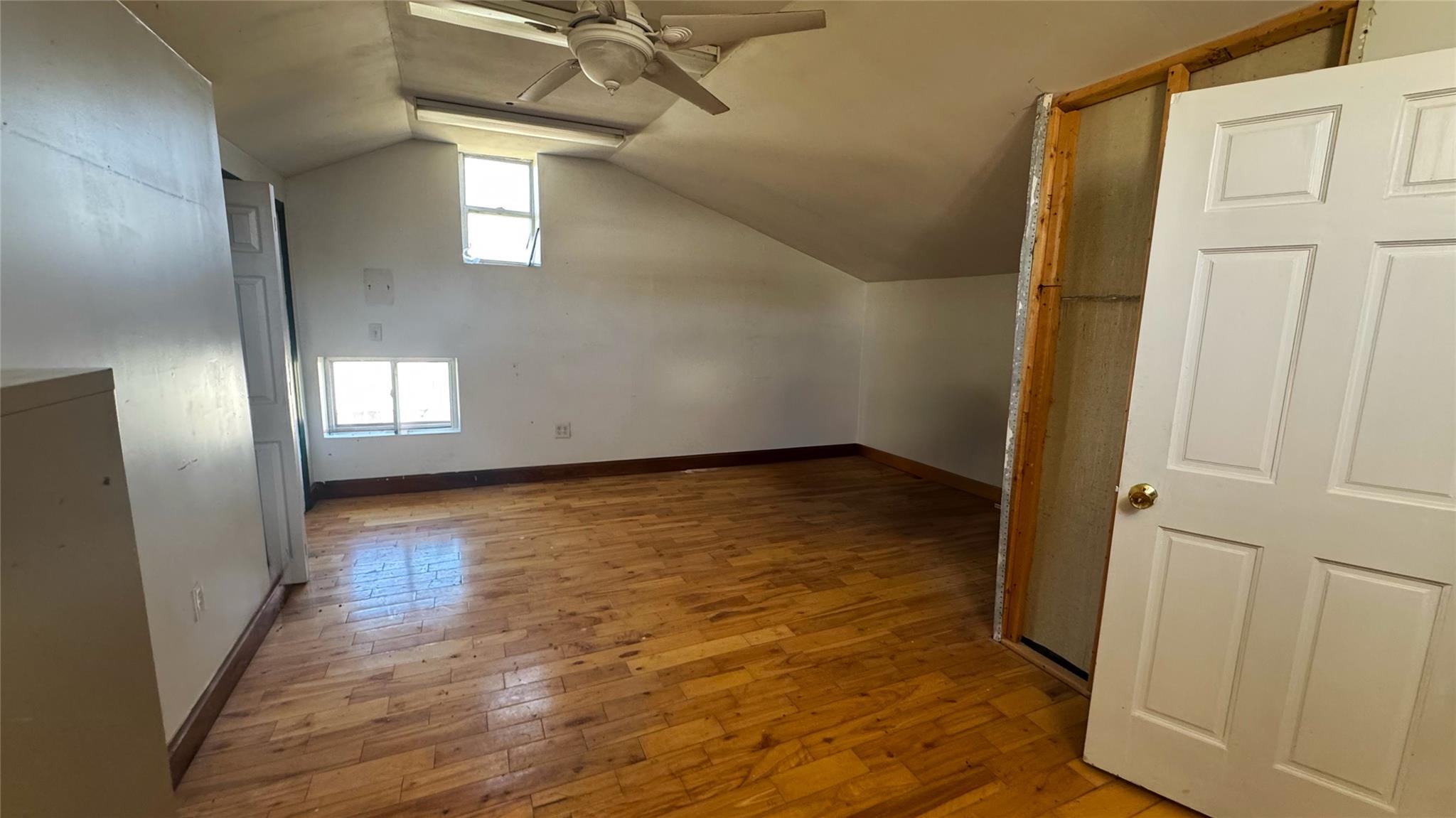 892 Bowbell Road Greene, NY 13778 - Photo 25 of 35 Bonus room featuring a ceiling fan, vaulted ceiling, and hardwood / wood-style floors
