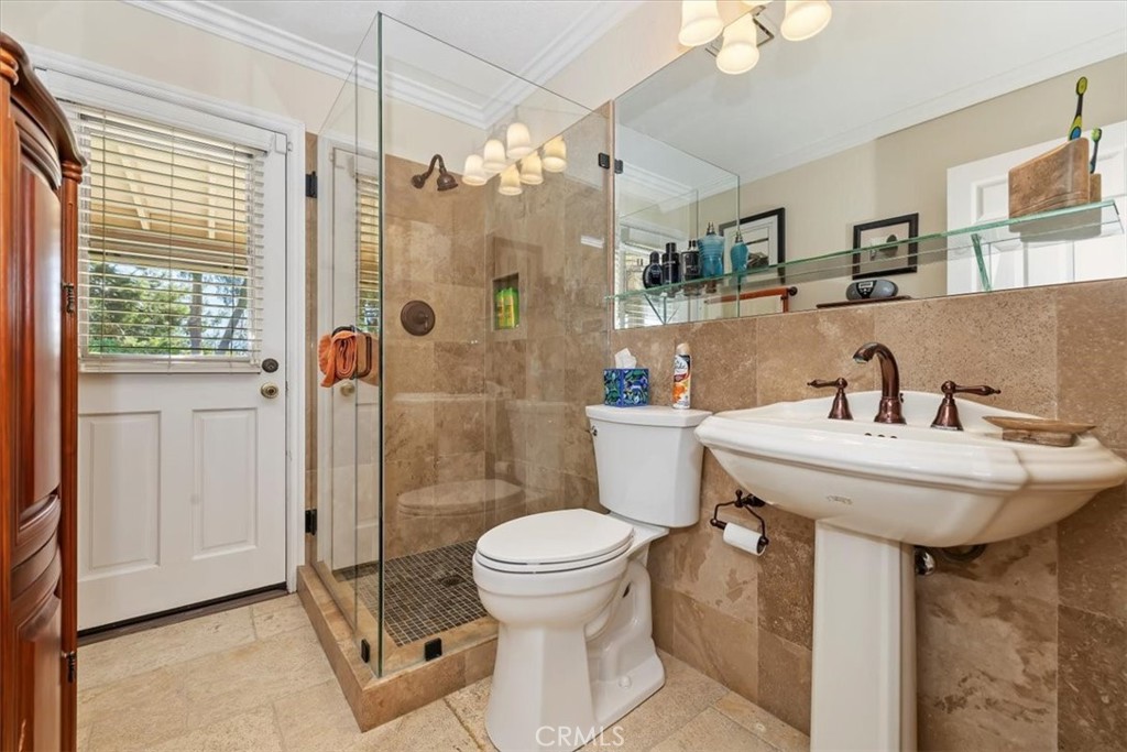 19 Black Oak Drive Phillips Ranch, CA 91766 - Photo 17 of 46 a bathroom with a sink toilet and shower