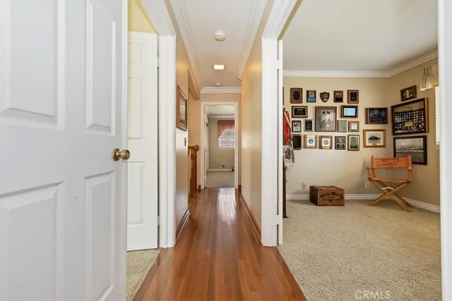 a view of a livingroom with furniture and a window
