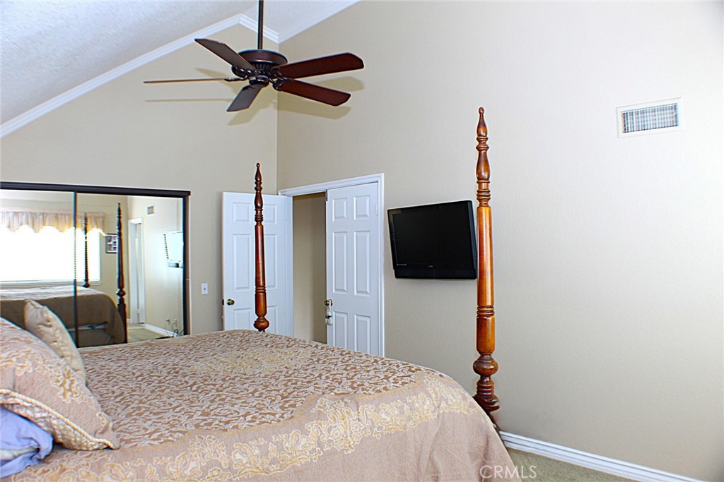 19 Black Oak Drive Phillips Ranch, CA 91766 - Photo 25 of 46 a bedroom with a bed and a flat screen tv