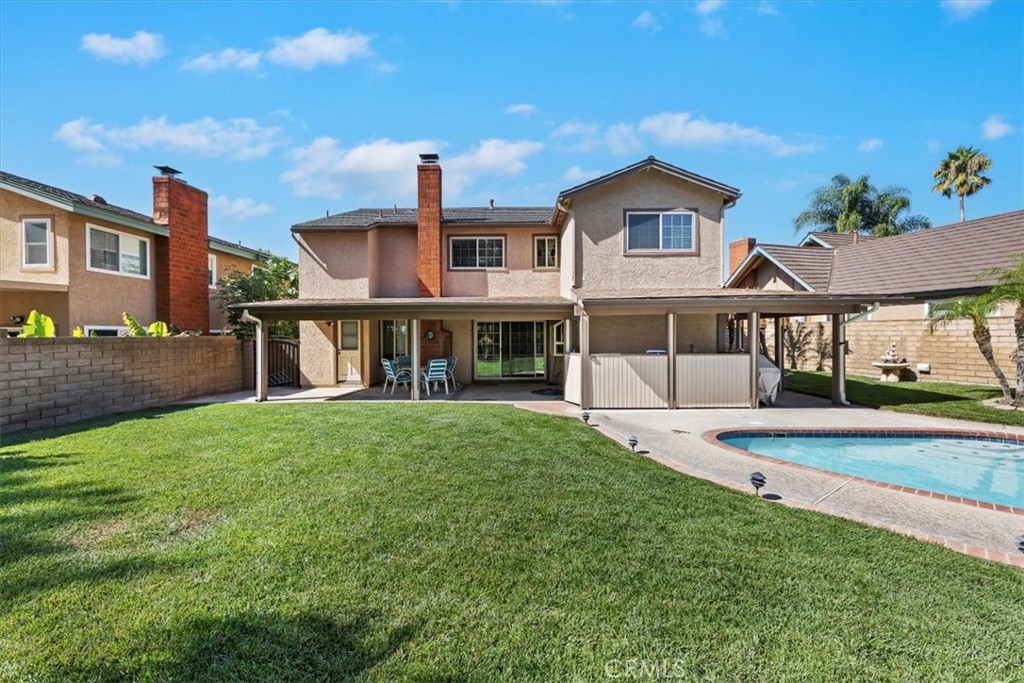 19 Black Oak Drive Phillips Ranch, CA 91766 - Photo 28 of 46 a front view of a house with a yard