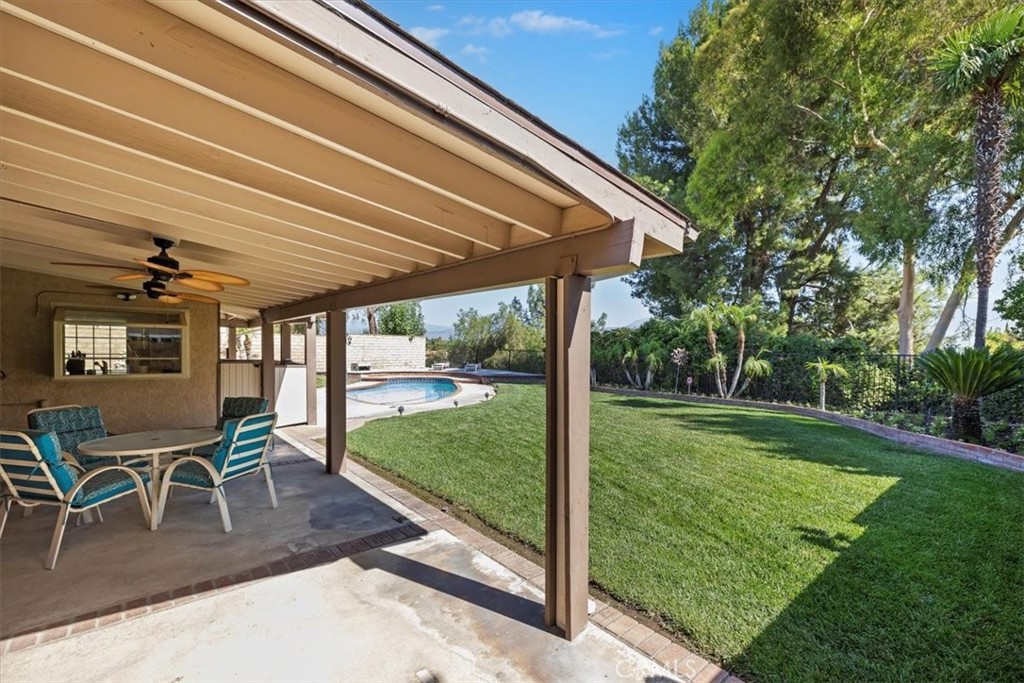 19 Black Oak Drive Phillips Ranch, CA 91766 - Photo 32 of 46 a patio with table and chairs