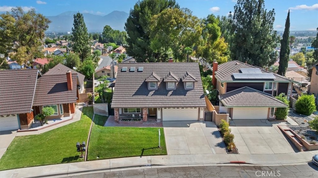 19 Black Oak Drive Phillips Ranch, CA 91766 - Photo 42 of 46 a front view of a house with a garden