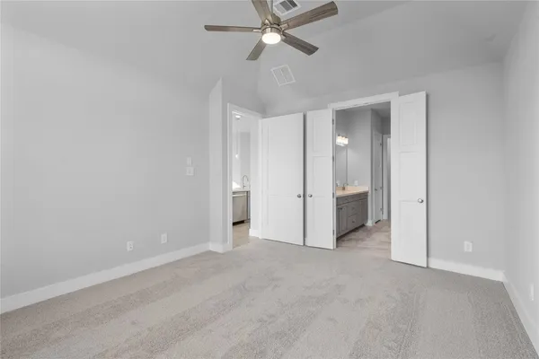 a bathroom with a double vanity sink mirror and double