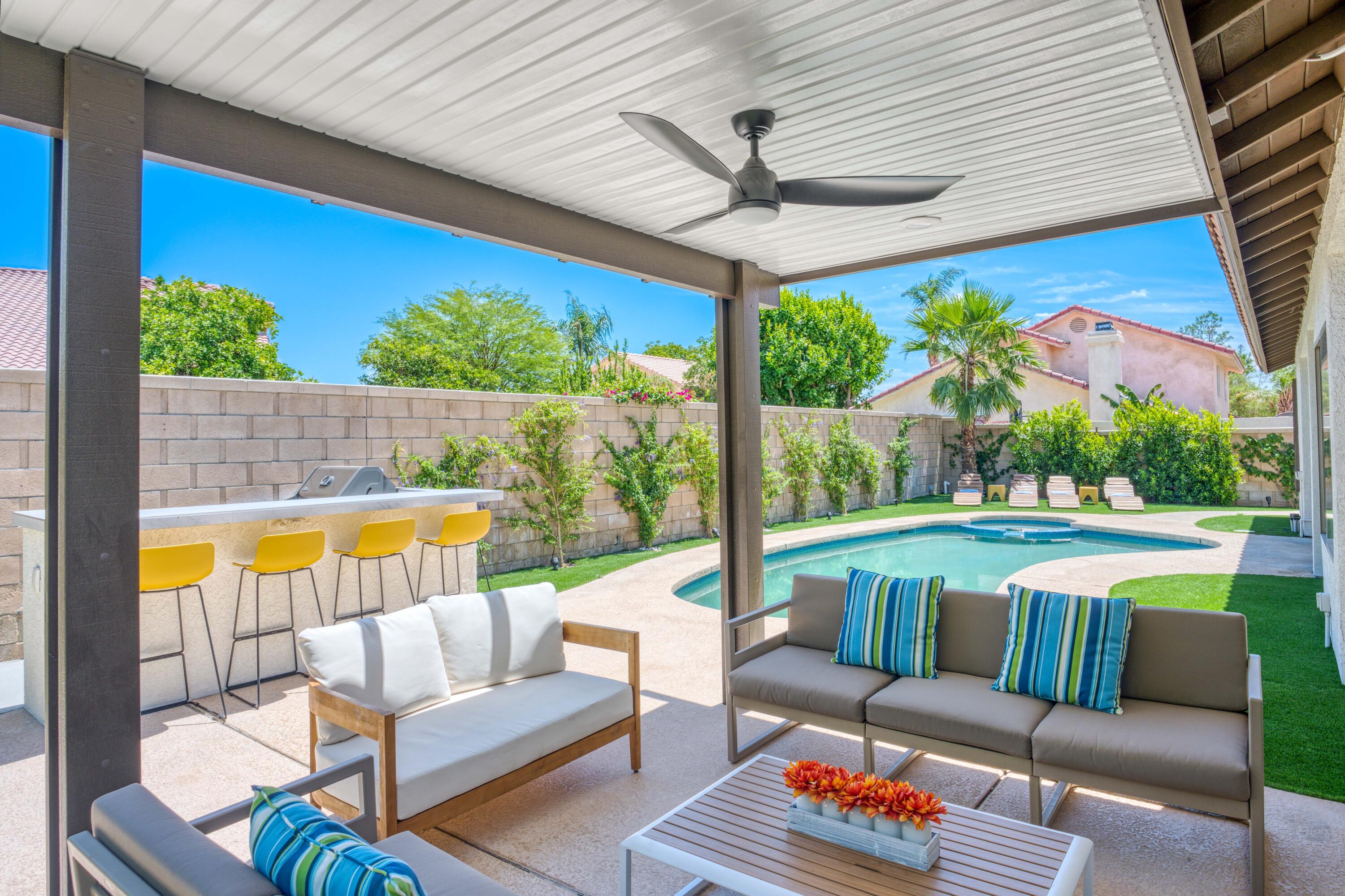 a outdoor living space with furniture and a patio