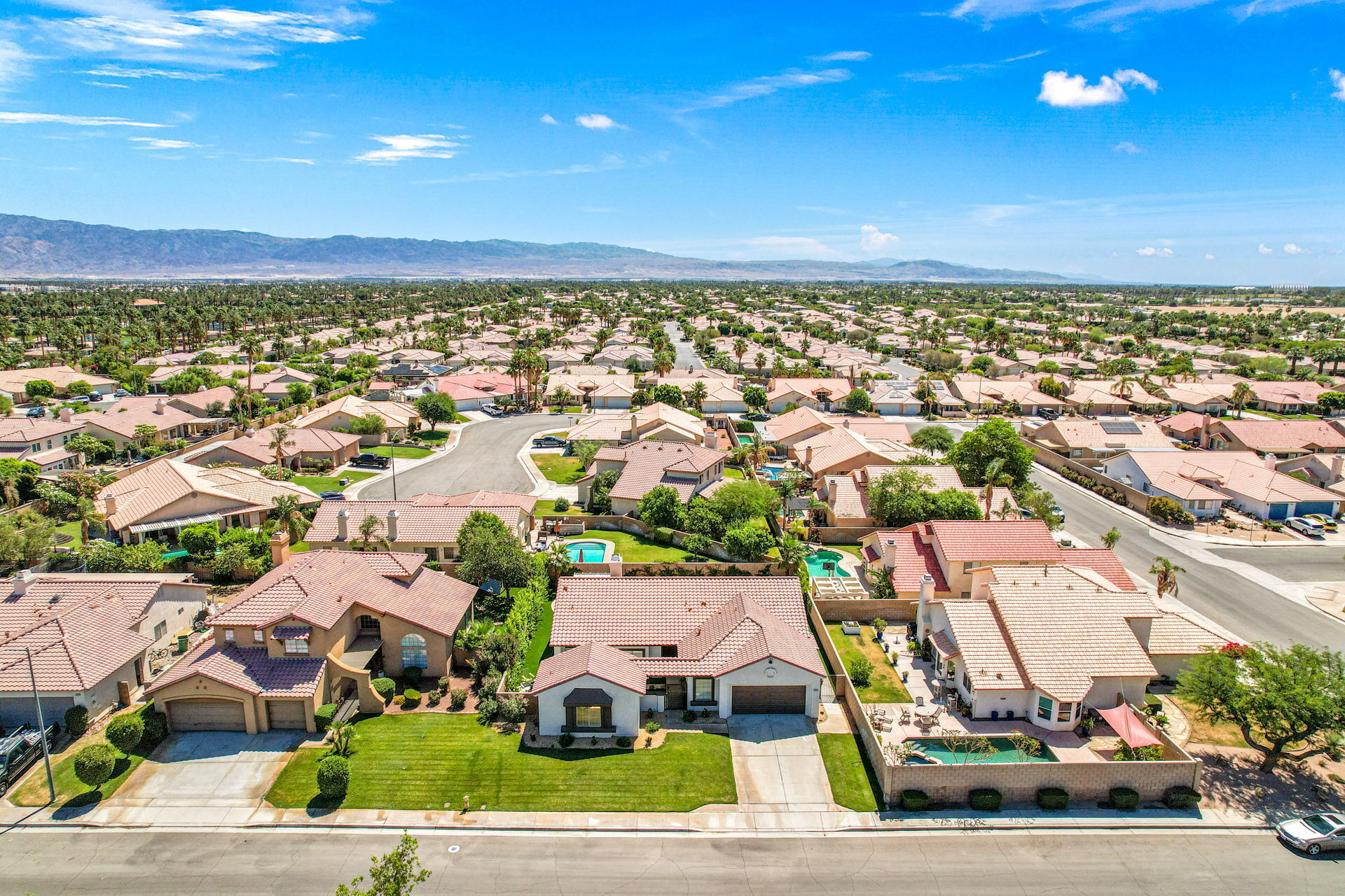 48674 Gibraltar Street Indio, CA 92201 - Photo 13 of 49 an aerial view of residential houses with outdoor space