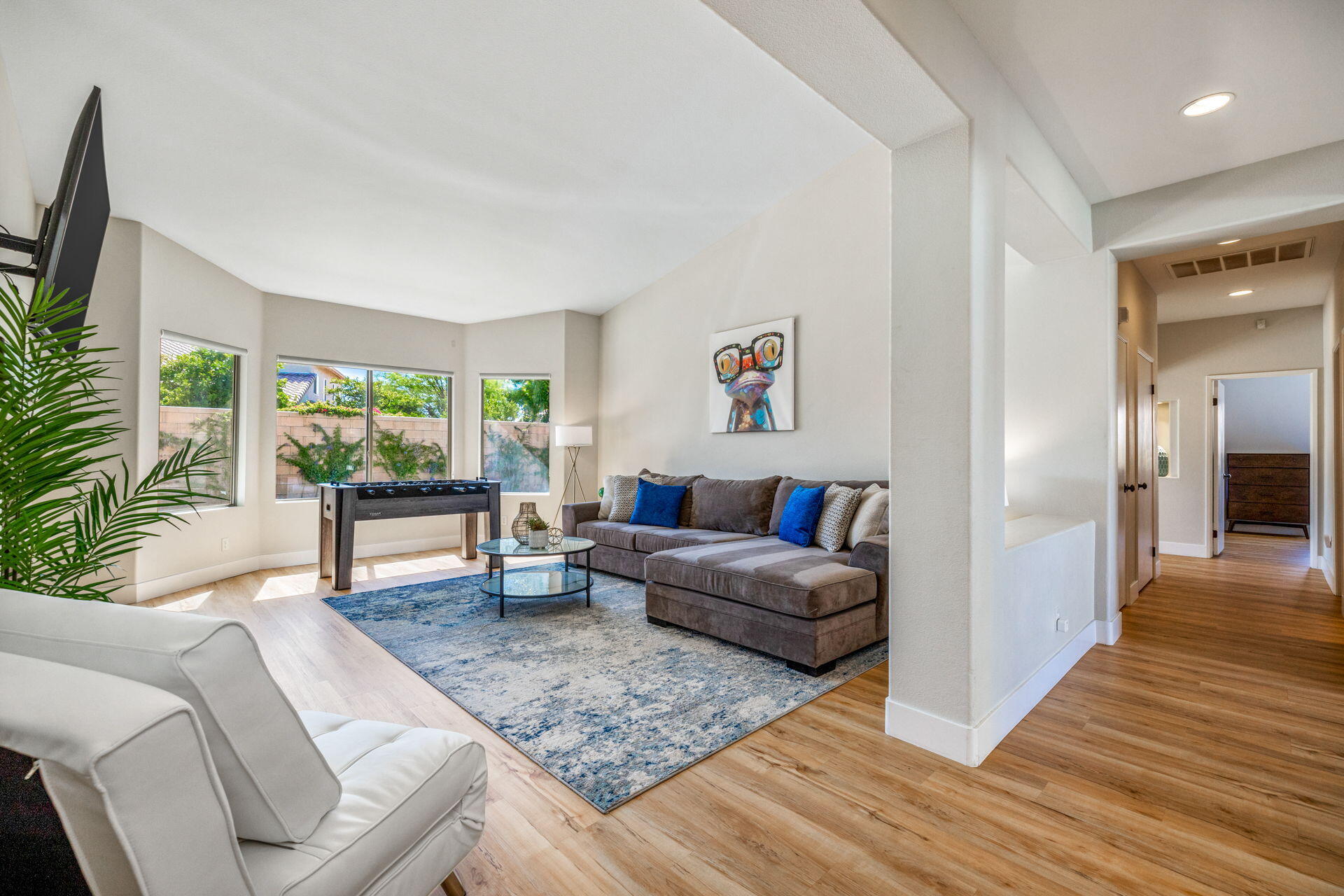 48674 Gibraltar Street Indio, CA 92201 - Photo 15 of 49 a living room with furniture and a wooden floor