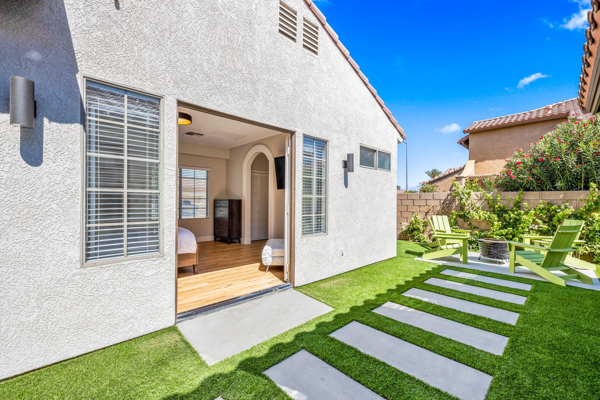 48674 Gibraltar Street Indio, CA 92201 - Photo 32 of 49 a front view of a house with a yard