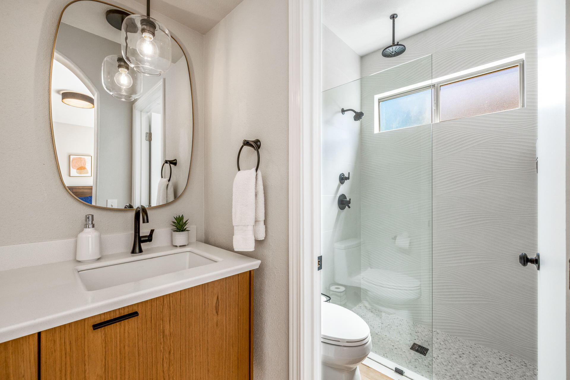 48674 Gibraltar Street Indio, CA 92201 - Photo 36 of 49 a bathroom with a sink a toilet and shower