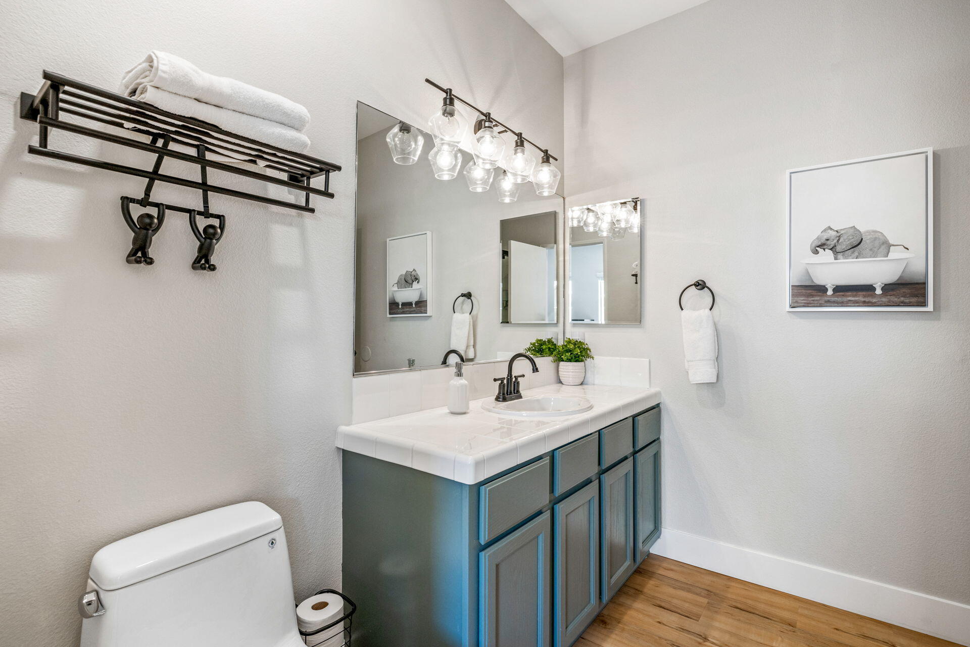 48674 Gibraltar Street Indio, CA 92201 - Photo 39 of 49 a bathroom with a sink a toilet and mirror