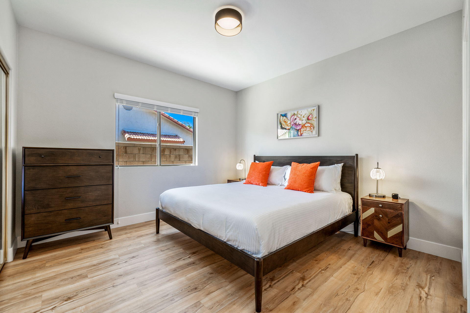 48674 Gibraltar Street Indio, CA 92201 - Photo 41 of 49 a bedroom with a bed and cabinet