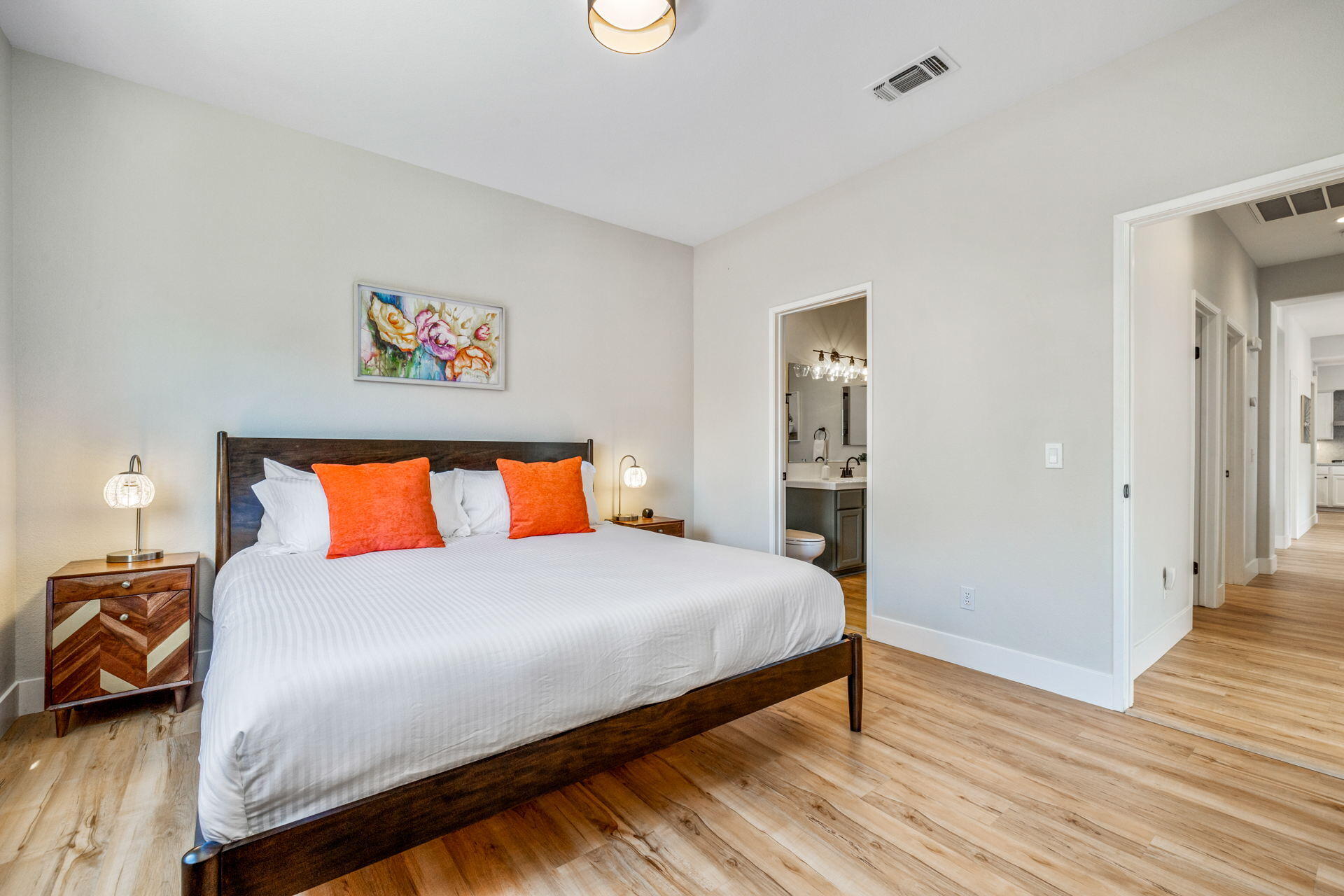 48674 Gibraltar Street Indio, CA 92201 - Photo 42 of 49 a bedroom with a bed and wooden floor