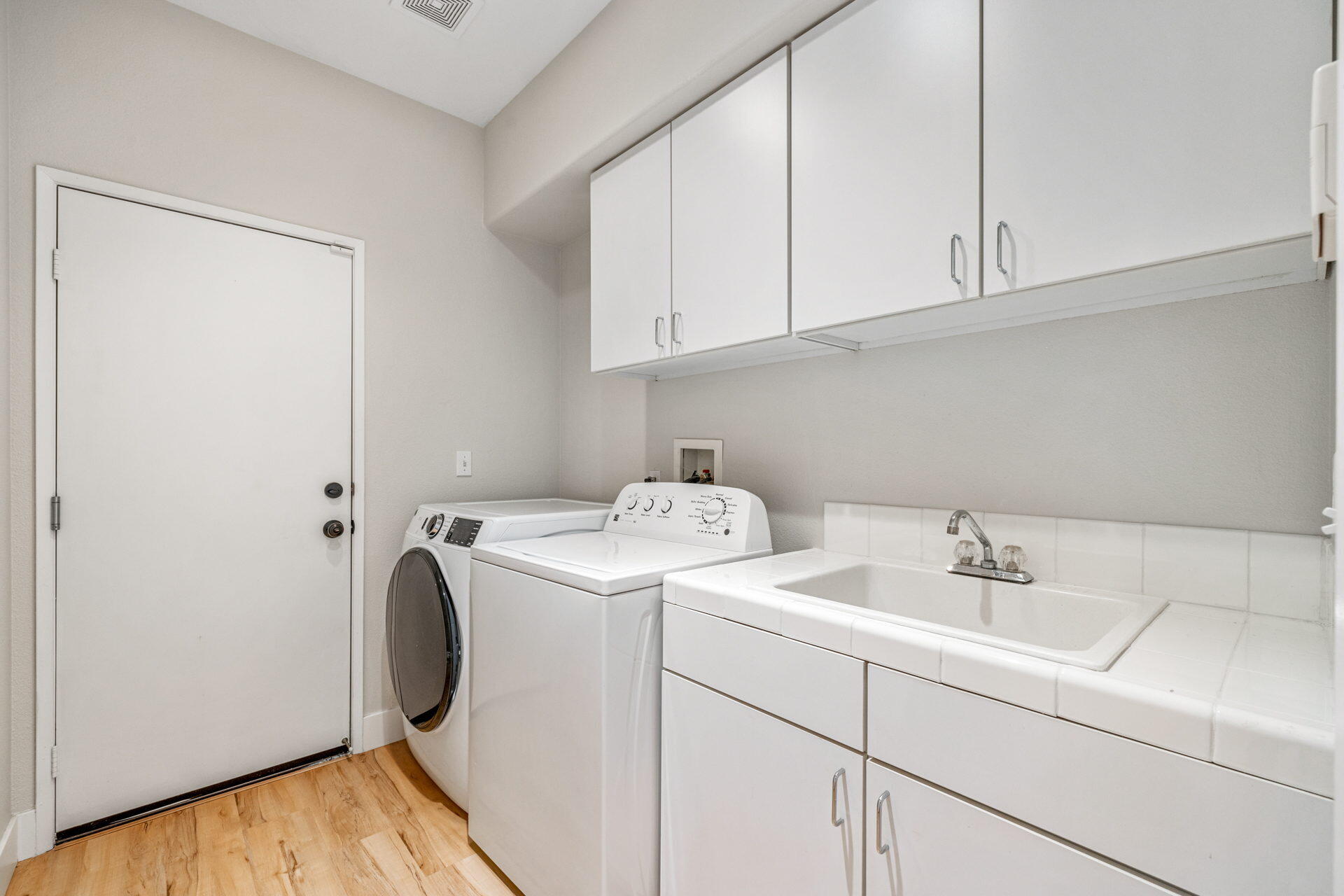 48674 Gibraltar Street Indio, CA 92201 - Photo 43 of 49 a utility room with dryer and washer