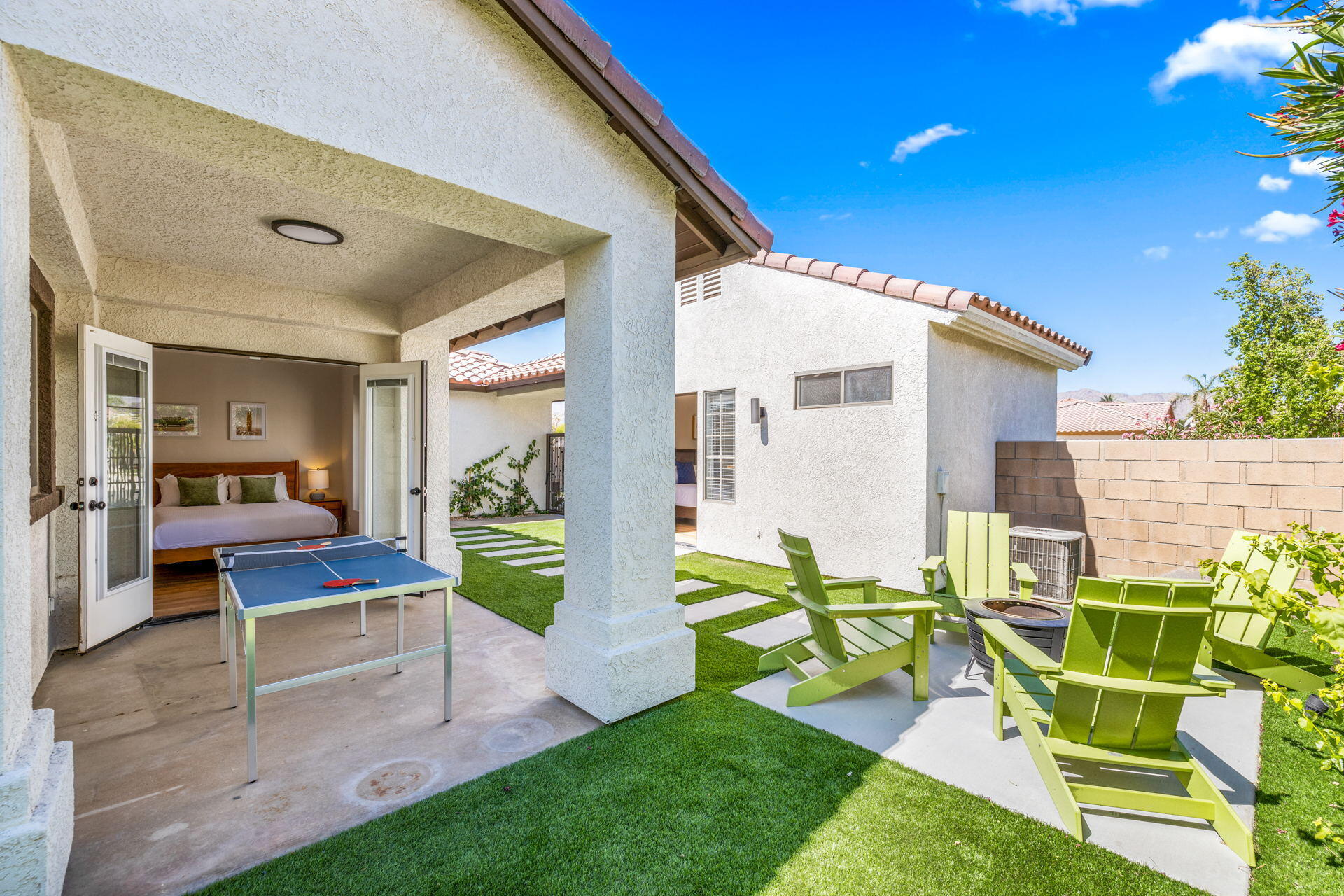 48674 Gibraltar Street Indio, CA 92201 - Photo 6 of 49 a view of a house with backyard and a patio